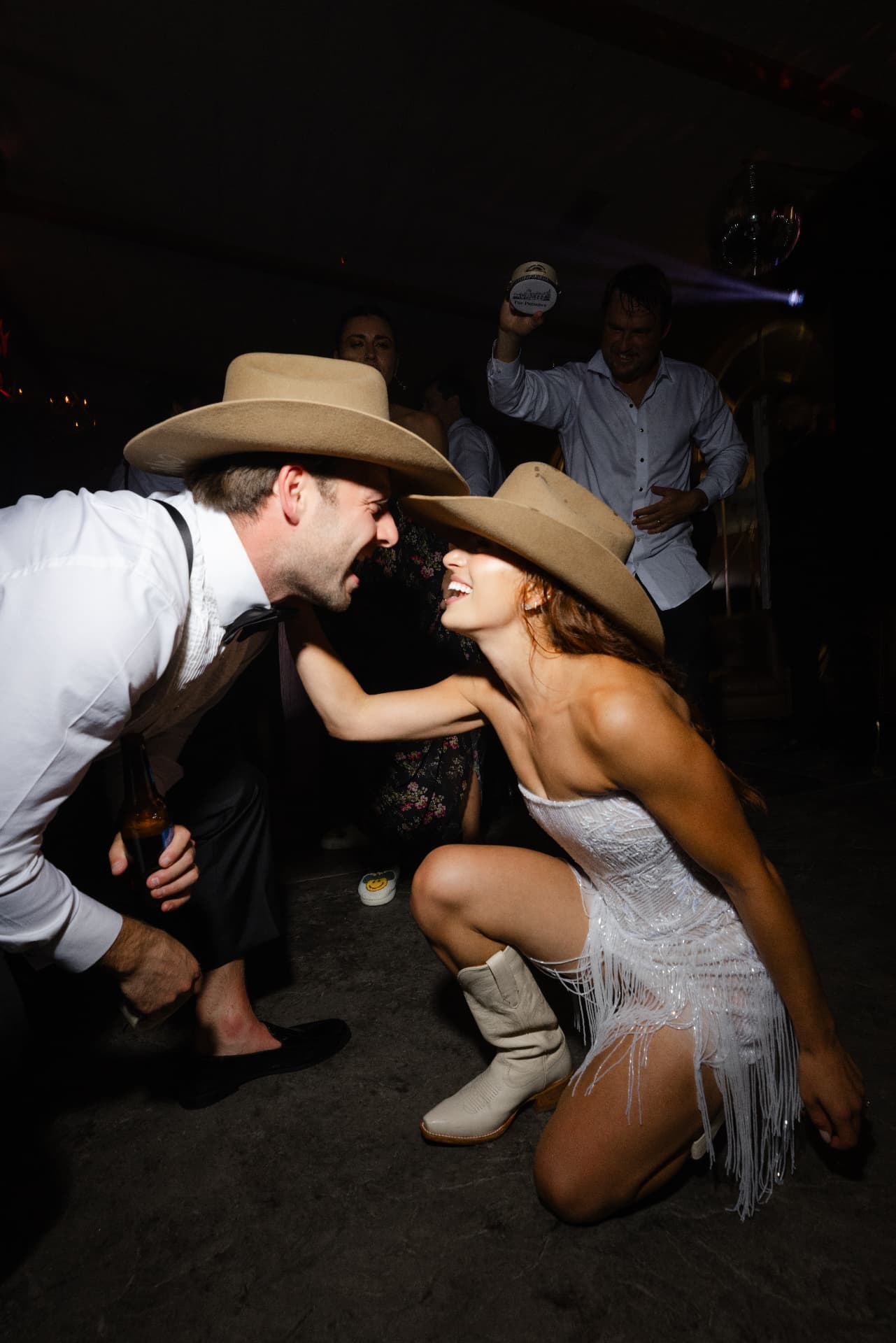Lexi and Erik laughing on the dance floor